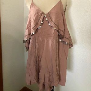 Romper- very pretty. NWT. Runs more like a small.